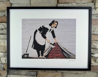 BANKSY: Framed lithograph. Limited edition with certificate, hand-numbered out of 150 copies.