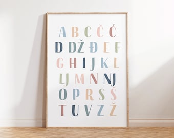 May include: A framed poster with the Czech alphabet in colorful letters on a white background.