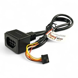 May include: Black controller adapter cable with a rectangular connector and a multi-pin port. The cable has a black sheath with a bundle of colored wires and a small label. The adapter is designed for a gaming console.