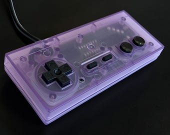 Mando NES morado atómico transparente: mando de 8 bits restaurado y personalizado, auténtico Nintendo Entertainment System
