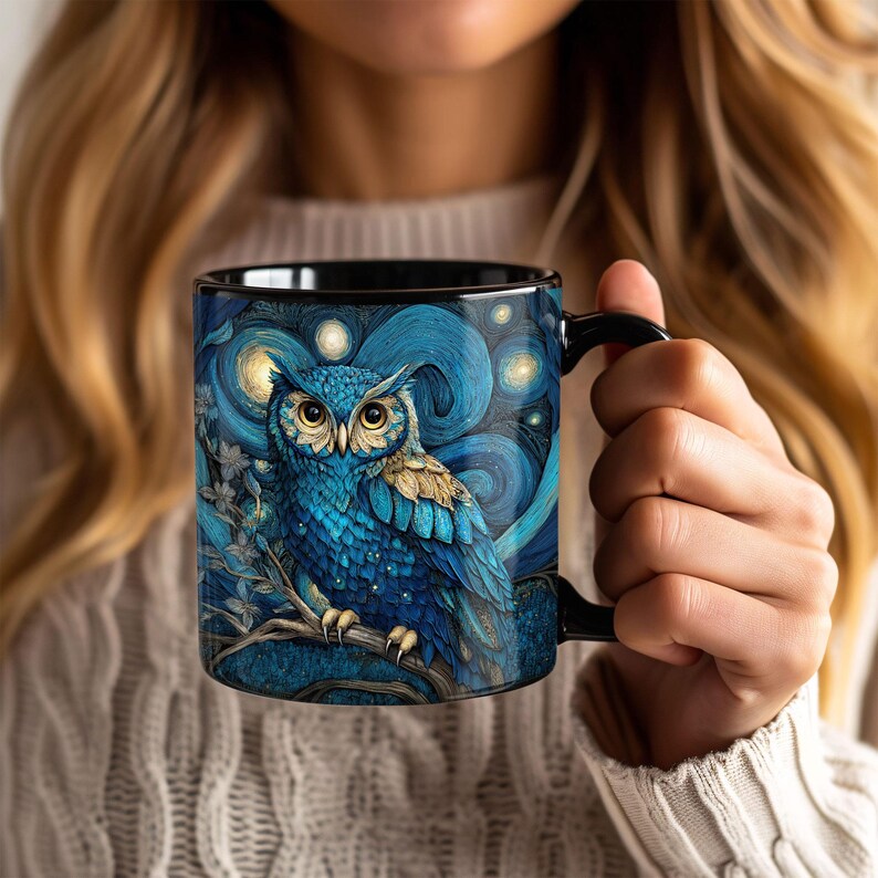 May include: A black ceramic mug featuring a detailed illustration of a blue owl perched on a branch. The background displays a swirling night sky pattern with glowing yellow stars and circular motifs, rendered in a textured, painterly art style.