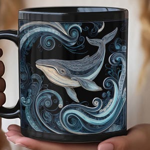 May include: Black ceramic mug featuring a detailed illustration of a whale swimming amidst swirling blue and white waves. The whale is depicted in shades of gray and cream, set against a dark background. The mug has a black handle.