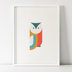 May include: A framed art print with a geometric owl design. The owl has a white head, a teal triangular top, and a body of orange, yellow, and teal shapes. The artwork is set against a white background, in a white frame.