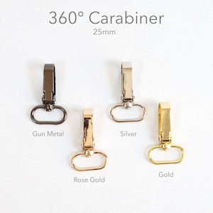May include: Four 25mm 360° carabiners in gun metal, silver, rose gold, and gold finishes. Each carabiner has a rectangular top and an oval-shaped bottom loop. The text "360° Carabiner" and "25mm" are at the top.