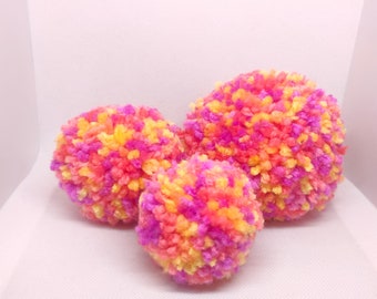 Pom poms of various colours.