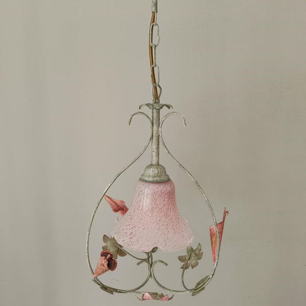 Wrought iron and glass pendant light in the shape of a pinkish serrated tulip