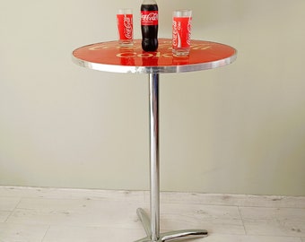 Table mange debout Coca Cola
