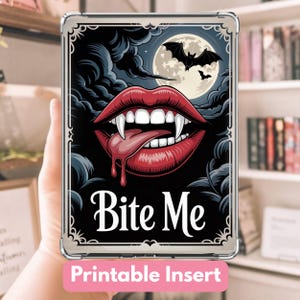 May include: A clear case with a black and red graphic. The graphic features a pair of red lips with fangs, a tongue, and the words "Bite Me." A full moon and bats are in the background. The words "Printable Insert" are at the bottom.