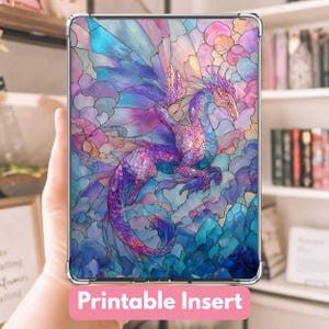 May include: A colorful printable insert featuring a dragon design. The dragon is depicted in shades of purple, blue, and pink, with a stained-glass effect. The text "Printable Insert" is displayed in a pink banner at the bottom.