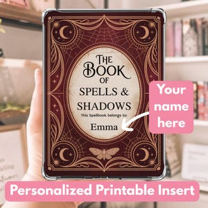 May include: A personalized printable insert for a tablet case. The design features a burgundy cover with the text "The Book of Spells & Shadows" and the name "Emma". The design includes crescent moons, a spiderweb, and a butterfly.