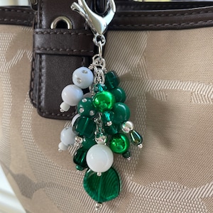 Green and white purse bag charm