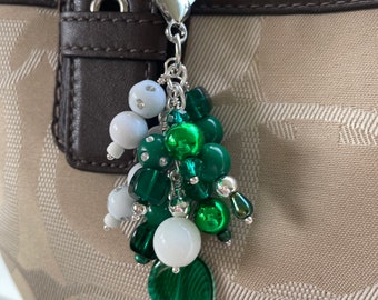 Green and white purse bag charm