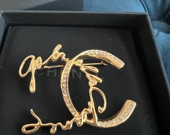 Authentic vintage Chanel calligraphy brooch