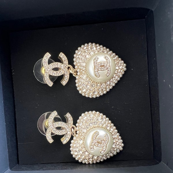 Authentic vintage large heart Chanel earrings