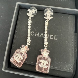 Authentic vintage pink bottle Chanel earrings