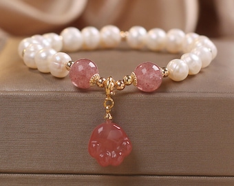 Pulsera ajustable de perlas: Pulsera con colgante de cristal y pata de gato