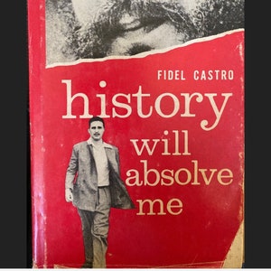 May include: A vintage book cover with a red background and the title "history will absolve me." The cover features a black and white image of a man's face and a photo of a man in a suit. The author's name, Fidel Castro, is also visible.