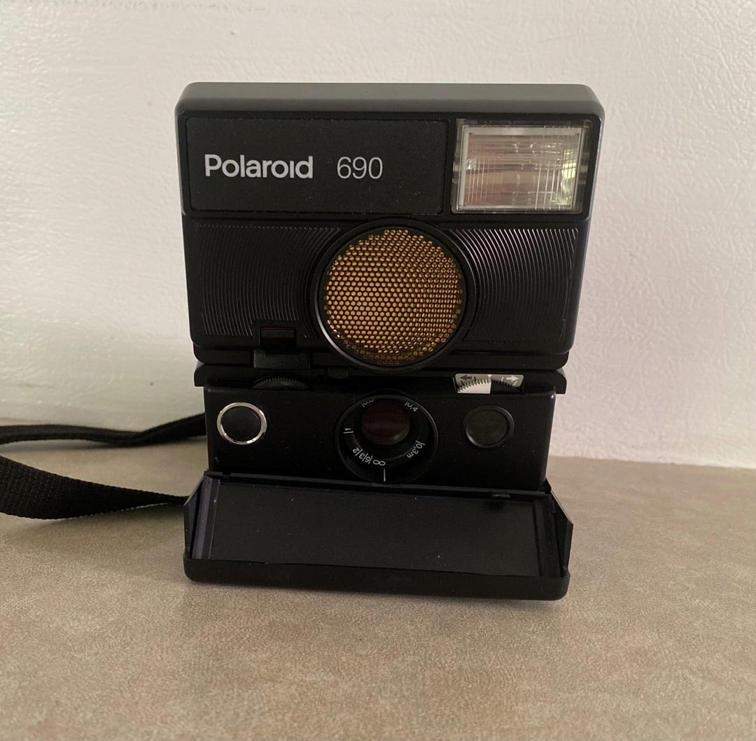 Polaroid 690 SLR Point & Shoot Instant Film Camera From Polaroid 690 SLR Point & Shoot Instant Film Camera From
