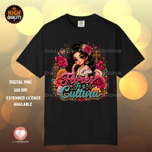 May include: A black t-shirt featuring a graphic illustration of a person with dark hair surrounded by colorful flowers, a cross, and a heart. The text "Flores Fe y Cultura" is printed in a stylized font below the figure, set against a dark background.