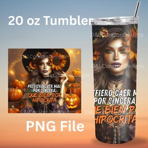 May include: A 20 oz tumbler featuring a woman with sunflowers and a witch hat, with text in Spanish. The design includes pumpkins and fall colors. The tumbler has a straw and a clear lid.