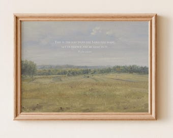 Puede incluir: Una impresión enmarcada de un paisaje con un marco de madera clara. La obra de arte representa un campo con árboles bajo un cielo nublado. El texto en la parte superior dice: "THIS IS THE DAY THAT THE LORD HAS MADE; LET US REJOICE AND BE GLAD IN IT."