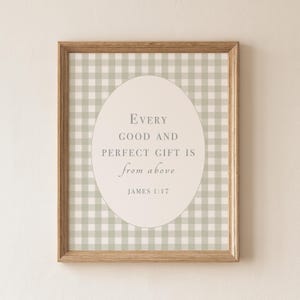 May include: A framed wall art print featuring a light sage green and white gingham pattern background. Centered is a cream-colored oval containing the text: Every GOOD AND PERFECT GIFT IS from above JAMES 1:17 in a dark gray serif font.
