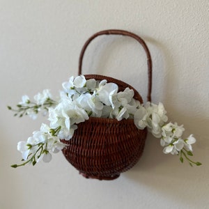 Vintage hanging wicker basket with lid