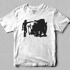 Peut inclure: Un t-shirt blanc avec une silhouette noire d'une figure pointant vers une grande forme abstraite.