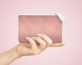 Roségouden mini-clutch met bloemen