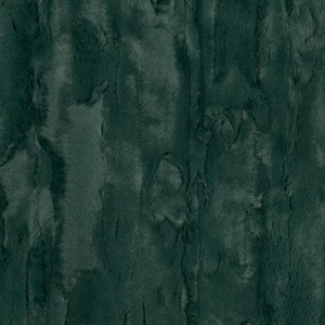 May include: A close-up of a dark green faux fur fabric with a textured, striated pattern.