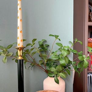 Two Orange Taper Candles