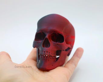 Zwart-rode autobedel met schedel: scharnierend kaak-gothaccessoire