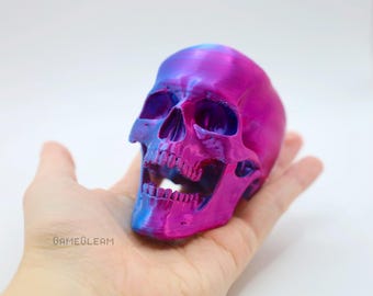 Blauw-paarse autobedel schedel: scharnierende achteruitkijkspiegelhanger