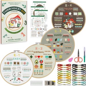 May include: An embroidery kit with a box featuring the text "EMBROIDERY KIT" and "STITCH YOUR STORY". The kit includes embroidery hoops, needles, scissors, thread, and instructional diagrams. The hoops are labeled "Easy", "Normal", "Hard", and "Tough".