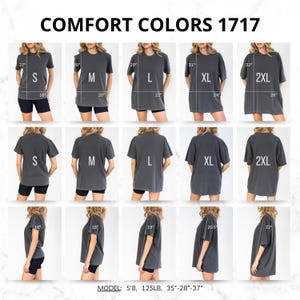 May include: A display of Comfort Colors 1717 t-shirts in various sizes, including S, M, L, XL, and 2XL. The shirts are a dark gray color, with measurements in inches. The image shows front, back, and side views of the shirts.