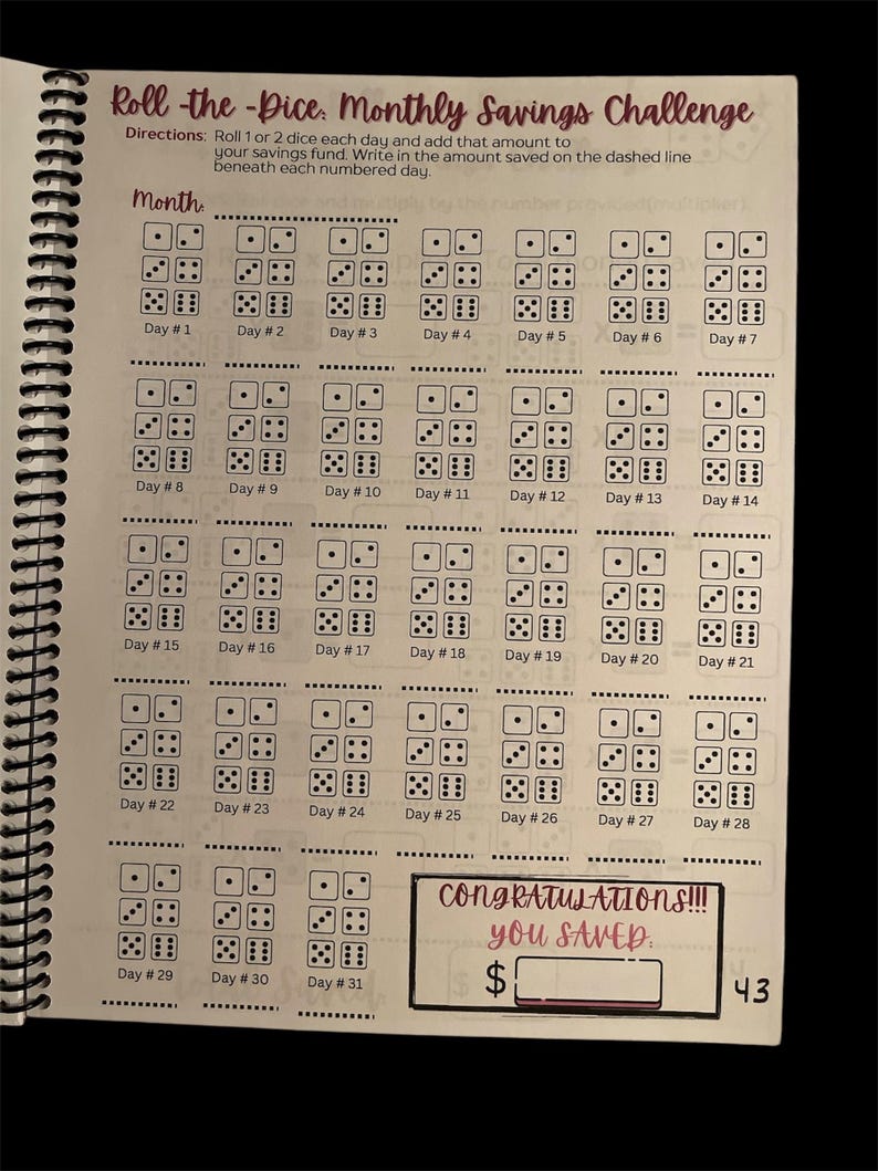 May include: A printable monthly savings challenge with a dice theme. Roll the dice each day and add the amount to your savings fund. Write the amount saved on the dashed line beneath each numbered day.  Congratulations!!! You Saved. $