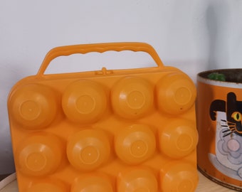 Vintage orange plastic egg box