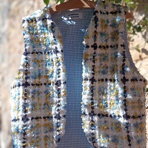Sleeveless shepherd's vest "Like a touch of..." tuft