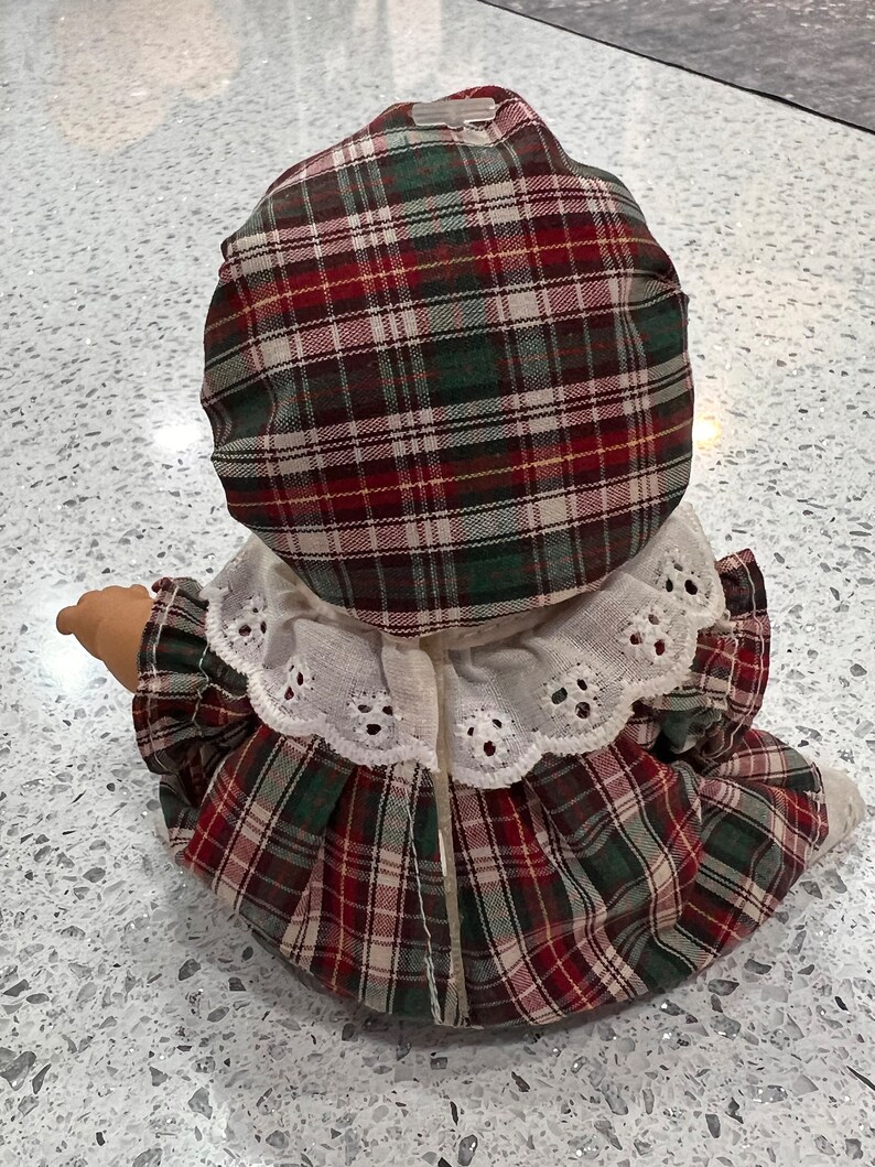 Palm Pals Bean Bag Kids Doll Wearing a Red and Green Plaid Dress and a