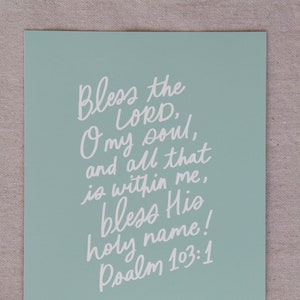 May include: A light blue printable art print with white text that reads "Bless the LORD, O my soul, and all that is within me, bless His holy name! Psalm 103:1".