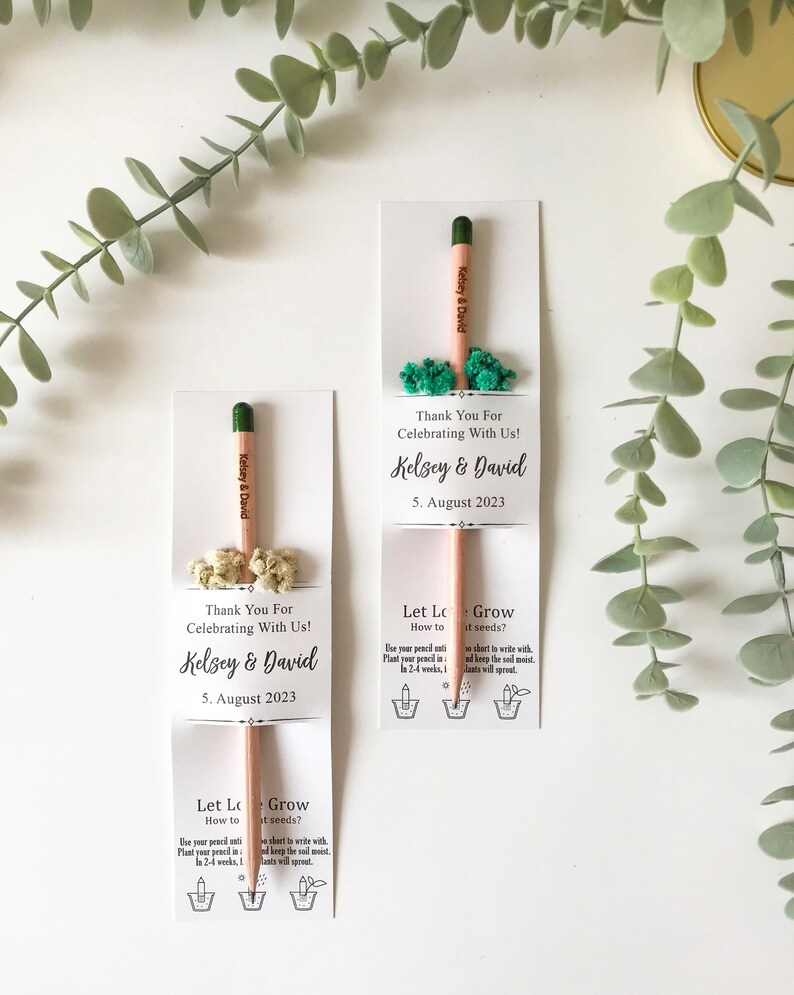 There are colorful flowers and a pencil with seeds on the card.