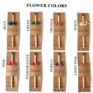 There are colorful flowers and a pencil with seeds on the card.