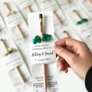 There are colorful flowers and a pencil with seeds on the card.