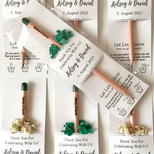 There are colorful flowers and a pencil with seeds on the card.