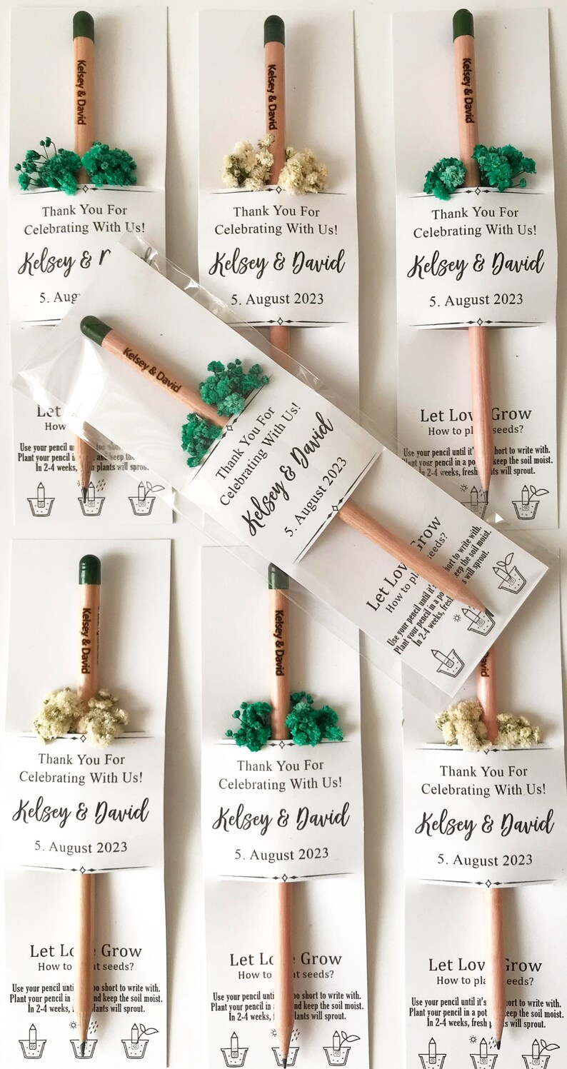 There are colorful flowers and a pencil with seeds on the card.