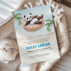 May include: Baby shower invitation featuring a watercolor illustration of a panda bear relaxing on a donut float in the ocean. The invitation includes details for Hailey Carter's baby shower, including the date, time, and location.
