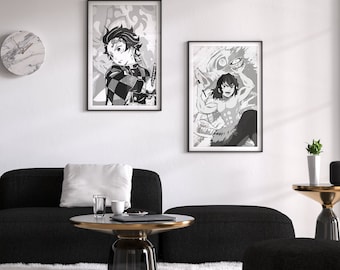 May include: Two framed black and white anime art prints hang on a white wall. One features a character with checkered clothing and a sword. The other depicts a muscular character. A black sofa, coffee table, and rug complete the room.
