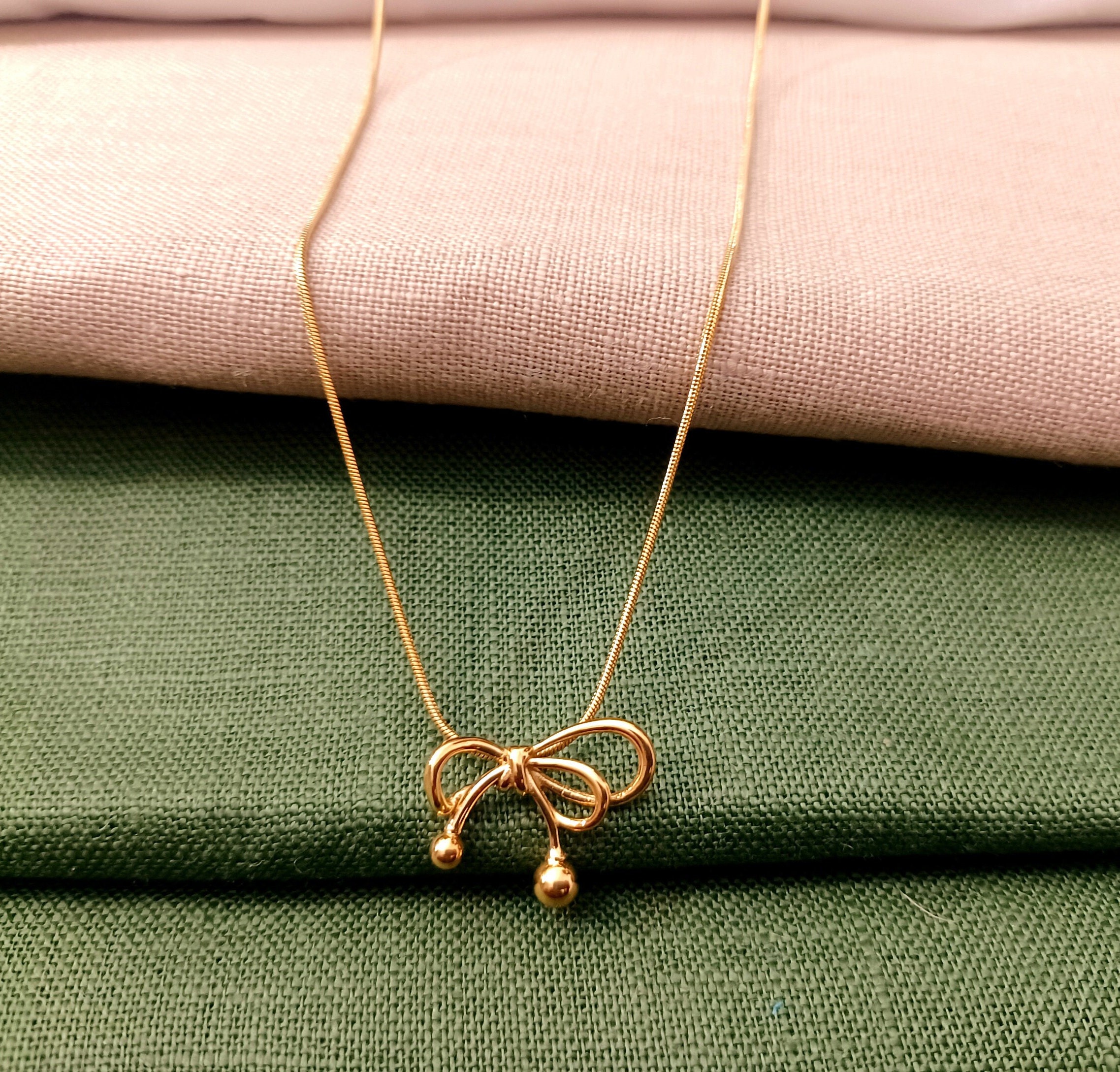 Gold tie chain necklace with price store