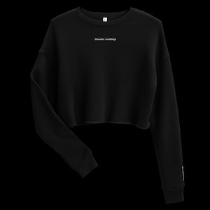 May include: Black cropped sweatshirt with long sleeves and the text "[thunder rumbling]" printed on the front.
