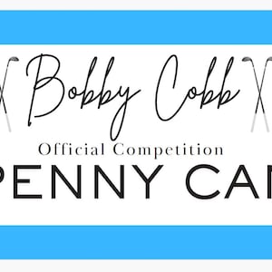 May include: A white background with the text "Bobby Cobb Official Competition PENNY CAN" in black. Two golf clubs are crossed on either side of the name. Light blue bars are at the top and bottom.